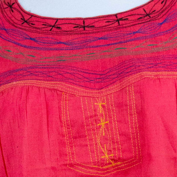 Mexican traditional handmade embroidered blouse close up