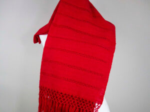 Front view of a Traditional Handwoven Mexican Red Shawl Scarf Wrap made of 100% cotton on a mannequin
