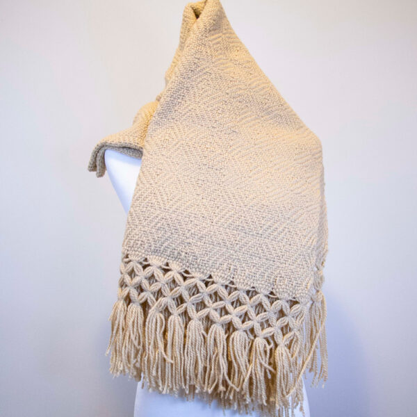 Front view of a Traditional Handwoven Mexican Beige Shawl Scarf Wrap made of 100 % cotton on a mannequin
